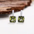 Detail of square olive green emerald earrings with cubic zirconia in silver setting - Square / Olive Green