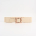 Close-up of beige elastic belt featuring a gold square buckle with rhinestone leaf patterns - Beige