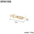 Dettaglio macro di un connettore a fiocco dorato con zirconi chiari e doppi anelli - BP00190B-Oro Bianco Fiocco