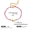 Rosa gewobenes Freundschaftsarmband mit goldenem Edelstahlschleife-Anhänger und Verschluss - Schleife Rosa Seil Stil (JDB0205064)