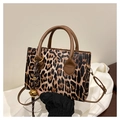 Chic leopard print small square handbag with golden bell charm and brown handles - With Pendant / Brown