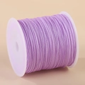 0.8mm purple nylon cord for jewelry making on a white plastic spool for DIY crafts - Light Purple