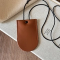 Detail view of the brown faux leather magnetic glasses holder pendant with snap closure - 6# Necklace Brown Arched Opening Bag