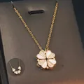 Convertible gold clover necklace with heart-shaped pendants and sparkling crystals - Gold - Clover Convertible