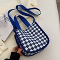 Blue and white checkered houndstooth canvas crossbody bag with blue fabric shoulder strap - Blue