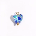 Macro detail of a heart-shaped blue glass charm with a gold metal pin for DIY jewelry - Transparent Dark & Light Blue Heart Style (Style 8)