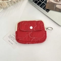 Macro shot of red quilted wallet with white rabbit embroidery and resin button - Rabbit Red