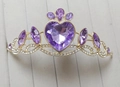 Golden princess crown featuring a large purple heart gemstone and crystal wave design - Light Purple