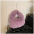 Fashionable purple faux fur handbag with a plush texture for autumn and winter outfits - Light Purple