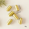 Set of 6 gold metal bell ornaments with matte brushed finish and capsule shape design - 6-Piece Set / Long Copper Bell
