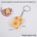 Mini PVC toasted bread slice keychain accessory in realistic golden brown finish - 4cm Roasted Toast Slice with Keychain