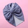 Detail of soft winter baby turban with large decorative bow in elegant blue-grey - Light Blue