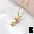 Golden girl pendant necklace with pearl head and zircons on a delicate bead chain - Girl Figure (B)