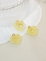 Drei gelbe Herzanhänger mit goldenen Schleifen auf Teller, DIY Schmuckzubehör - Gelb