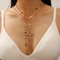 Golden multi-layer necklace with cross pendants and colorful gemstones on a model - Gold Colored Gemstone Stacked Set of 2 (23)