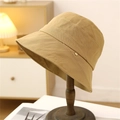 Minimalist khaki cotton bucket hat with gold metal buckle detail on a wooden stand - M (56-58cm) / Khaki