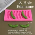 Detailed view of 8-cavity pink silicone mold for realistic edamame fondant and baking - 8-Cavity Edamame Mold