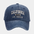 Detailed close-up of white 3D embroidery on vintage blue washed denim baseball cap - Adjustable / Embroidery/Distressed / Navy Blue