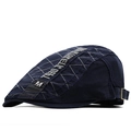 Detail of dark blue cotton ivy cap featuring gray diamond quilting and metal buckle - M (56-58cm) / Navy Blue