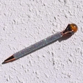 Detailed close-up of rose gold crystal ballpoint pen with sparkling rhinestones - Tiger Eye Stone Bracelet