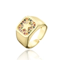 Detail of 18K gold plated ring featuring a square face with star and colorful zircon - Adjustable Open / Gold with Red & Mixed Zirconia