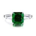 Three-stone sterling silver ring featuring emerald cut green gemstone and clear side stones - US 6 / Emerald Green