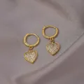 Elegant gold-plated hoop earrings featuring a micro-paved sparkling heart charm - Pave Heart Pendant / E-050---Gold