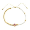 Detailed close-up of a beaded bracelet with purple zircon and beige adjustable cord - Light Purple