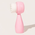 Close-up of pink dual-sided facial brush with soft white bristles and massage silicone pad - Small Standing Bump Facial Brush / Pink