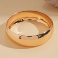 Detailed view of wide polished gold metal bangle with high-gloss mirror finish and elegant shine - Minimalist Polished Metal Bangle (Gold-Small)