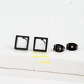Detail shot of matte black square stud earrings with size and weight measurement icons - Square / Black