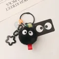 Cute black fuzzy coal sprite plush keychain with colorful beads and a heart charm - Black