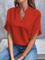 Detail of V-neck orange blouse with side-slit short sleeves in flowy fabric - Red