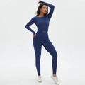 Detail of navy blue seamless scrunch yoga set featuring long sleeve crop top and high waist leggings - S / Dark Blue