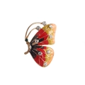 Macro shot of colorful enamel butterfly brooch with crystals and green gemstone detail - Colorful Enamel Green Gem Body Butterfly