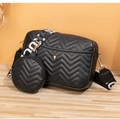 Detail of black V-quilted crossbody bag with gold hardware and wide lettered strap - Shoulder Bag Set / Black