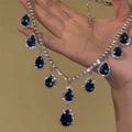 Macro shot of a vintage teardrop pendant featuring deep blue gems and silver rhinestones - 6# Silver Dark Blue Water Drop Style
