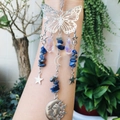 Detail of metal suncatcher with silver butterfly, stars, crescent moon and blue stones - Lapis Lazuli