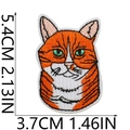 Detail of yellow cat embroidery patch with dimensions 5.4cm height and 3.7cm width - Orange Cat Head Style
