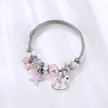 Silver bead bracelet with pink starfish horse charms and crystal beads on white background - Pink Horse