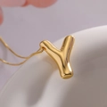 Gold balloon letter Y pendant necklace with a fine box chain and polished finish - Letter Y