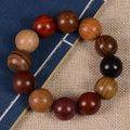 Handcrafted multi-wood beaded bracelet featuring various natural grains and rich tones - Multicolor (20mm*12 Beads Plain Precision)