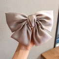 Elegant champagne satin oversized bow hair clip with a smooth glossy silk finish - Spring Clips / Gray
