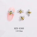 Macro detail of 3D bee nail charms with yellow enamel and white rhinestones on pink nails - Silver Base Black Enamel Bee Style (8360)