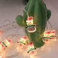 Festive LED string lights featuring small snowman charms with warm yellow glow - Dot Snowman (Injection)