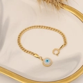 Modisches Set aus goldener Edelstahl-Halskette und Armband mit blauem Auge auf weißem Teller - Armband (2#手链)