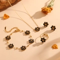 Golden flower jewelry set with grey cat eye stones including necklace, bracelet and ring - Black Cat's Eye Set