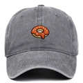 Close-up of donut embroidery on washed cotton baseball cap with vintage finish - Gray