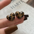 Close-up of heart-shaped resin leopard print earrings held between fingers - 33# 925 Sterling Silver Earring Post - Leopard Print - Heart