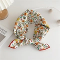White floral square scarf with orange leaf pattern and red borders in a knotted style - Colorful Fruit Floral